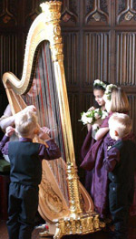 children watching the harp
